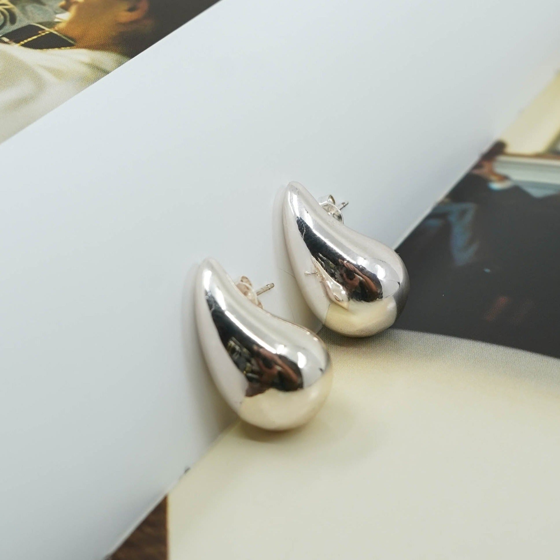 Aretes gota plateados